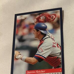Score Baseball Card with Blue and Red Details